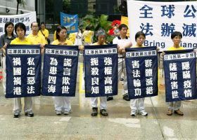 香港法轮功学员游行控诉江泽民(图)