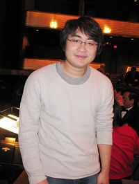 '在美国留学的曹书凯坐在剧院最高票价区,他说:“在国内就听说过神韵的大名,我在国内的家人都想看神韵,他们让我到了美国一定要看神韵。'