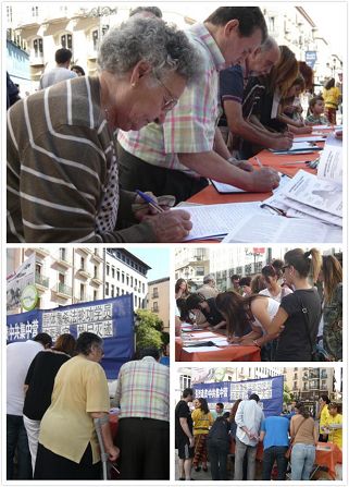 '图2:萨拉戈萨市民和游客们纷纷签名声援法轮功反迫害'