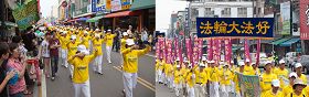 高雄地区法轮大法学员满怀喜悦,在人潮密集中心踩街游行,吸引许多民众观看,拍照留念。