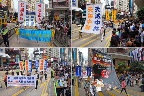 图3.壮观的游行队伍震撼港民与游客围观,不少人拿起相机、手机拍照。
