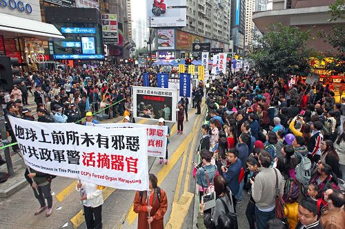 图9:揭露中共对法轮功残酷迫害的血腥与邪恶本质。