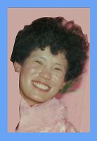 李梅生前照片被当局全部搜走后,从其结婚照上裁剪下来的一张遗照