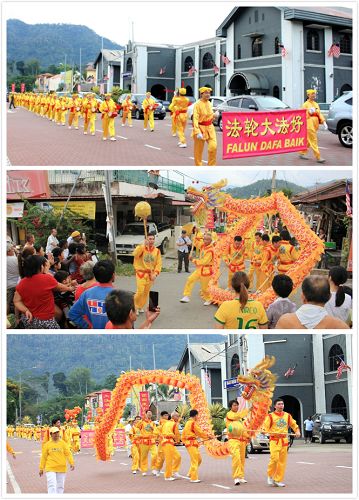 法轮功学员来到劳勿举办首场庆中秋游行,途经劳勿市区主要大道和华人集中区,深受当地居民的欢迎。