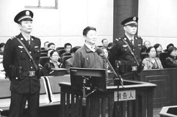 被告人李崇禧在庭审现场(网络图片)