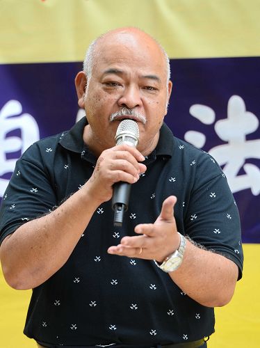 图7:前立法局议员曾健成希望法轮功学员能有一天回到天安门广场炼功打坐。