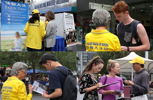 图1:法轮功学员在车士活市中心的维多利亚步行街上向民众讲真相