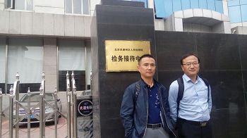 王振江律师(左)和李钟伟律师(右)