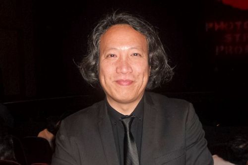 '图11:大年除夕夜,华人宇峰特地从大陆赶来佛州看神韵演出。'