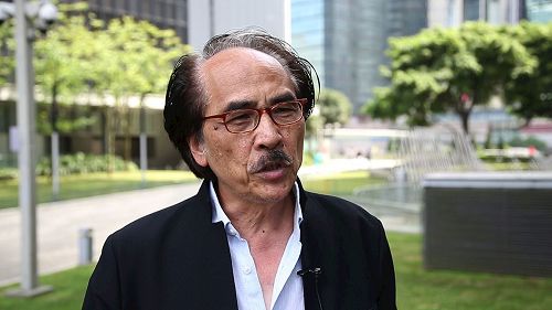 '图21:前档案处处长朱福强。'