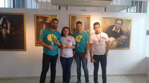 '图7:电话公司的年轻职员Carlos、Evandro、Paula和Anderultas欣喜自己听到法轮功的真相。'