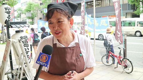 '图5:一位京都店员谴责活摘暴行'
