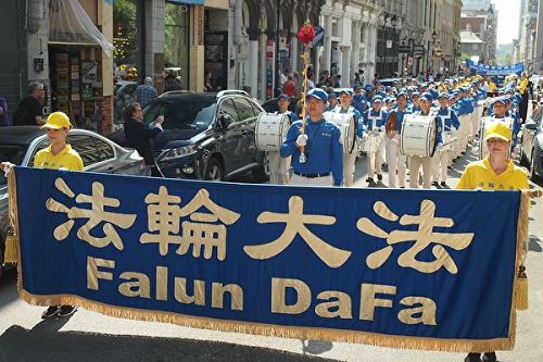 '图1~3:法轮功学员在加拿大蒙特利尔举行讲真相反迫害大游行。'