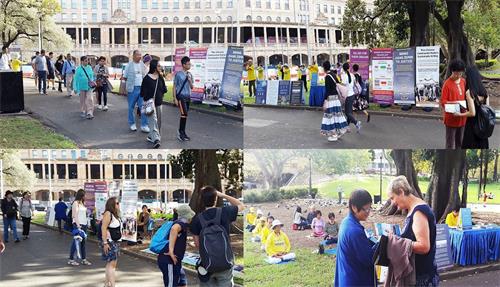 '图2:法轮功学员在市中心贝尔莫公园(Belmore?Park)的主街上展示法轮功的五套功法和真相展板'