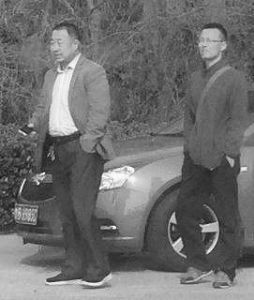 代玉刚和刘杰(戴眼镜)
