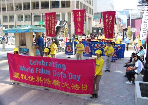 图1~7:五月九日来自加拿大东部渥太华、多伦多、蒙特利尔等城市的部分法轮功学员在加拿大国会山前庆祝法轮大法日。