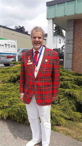 '图6:海悦节日协会主席大卫·布莱特先生表示,感谢法轮大法来到海悦节游行给社区带来的美好。'
