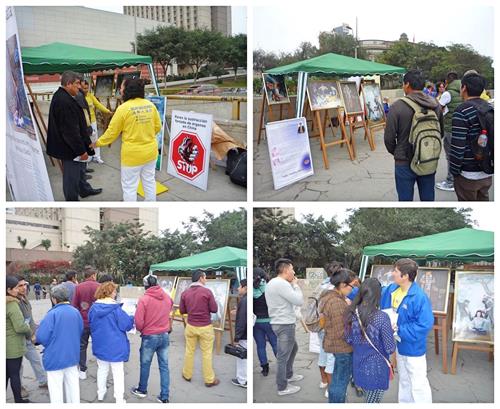 '图2:许多民众驻足,有的阅读真相展板,有的与学员攀谈了解真相。'