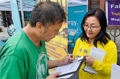 '图2:这位华裔李先生报名要参加九天班。'