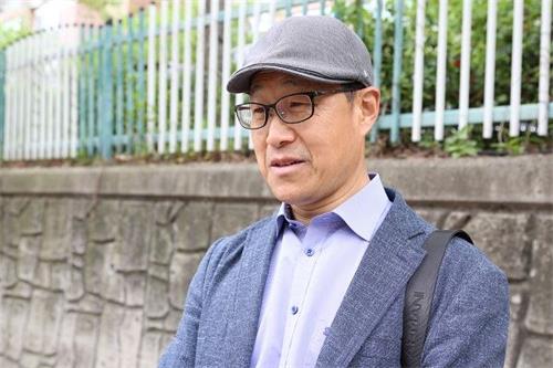 '图7:韩国学员沈相信参与了釜山的新闻发布会。'