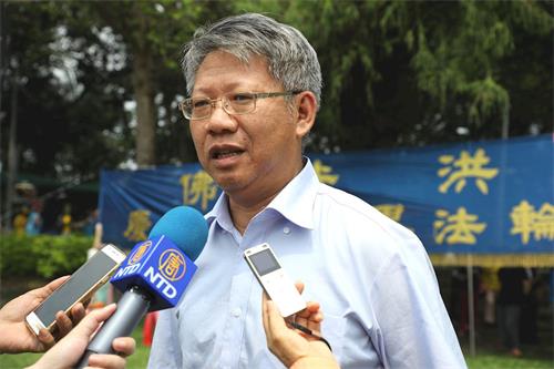 '图10:云林县浊水溪书画学会荣誉理事长黄登仕推崇法轮功是社会安定的力量。'