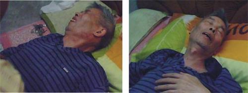 '谢德清被迫害得心中绞痛难忍,满脸痛苦'