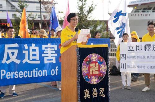 '图2:沈阳法轮功学员肖岩冰在集会上发言。。'