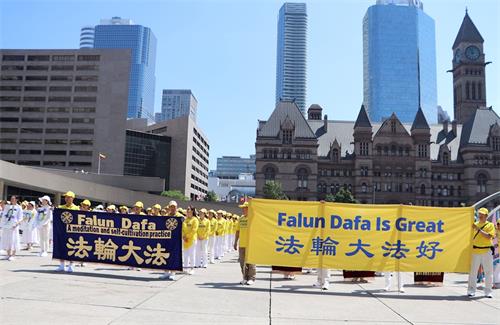 '图5~9:反迫害二十周年,加拿大法轮功学员大型集会现场。'