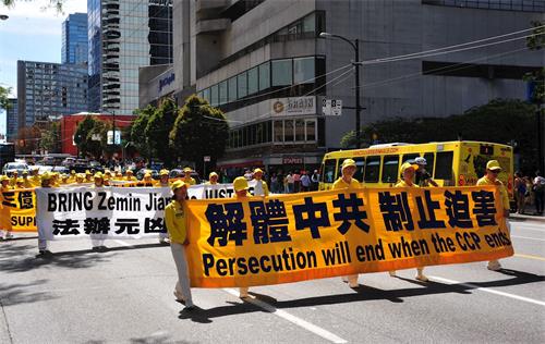'图8~13:2019年7月20日,温哥华法轮功学员及支持者在温哥华市中心繁华地带游行。'