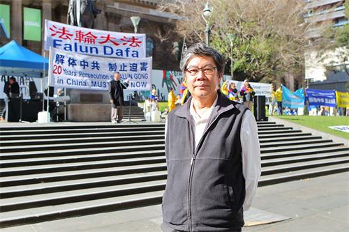 '图14:来自香港的墨尔本市民周明先生。'