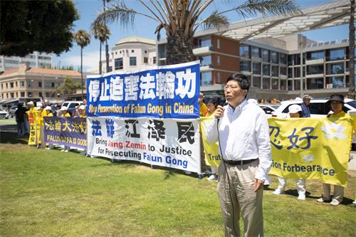 '图1:洛杉矶法轮大法学会发言人吴英年'