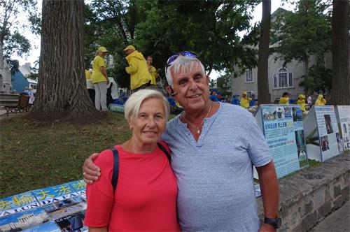 '图15:魁北克夫妇Serge和Odette齐声谴责中共对法轮功的迫害'