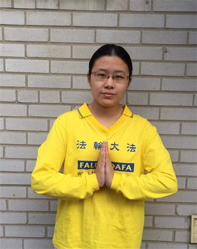 '图2:青年法轮功学员Rina'