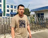 '展中香的儿子为了见母亲被警察打得眼睛、鼻子出血,身上多处伤痕'