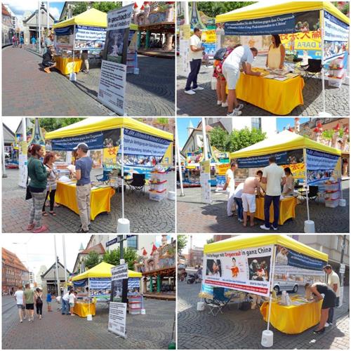 '图5:二零二零年八月十五日,法轮功学员在市政厅广场(Rathausplatz)举办信息日活动。'
