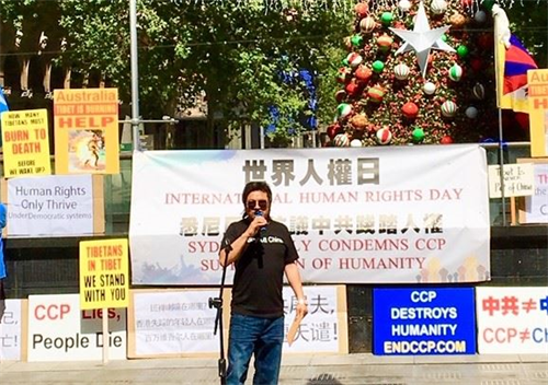 '图3:澳洲悉尼藏族青年大会主席津渡·奥色 (Tsundu Oser) 在集会上发言'