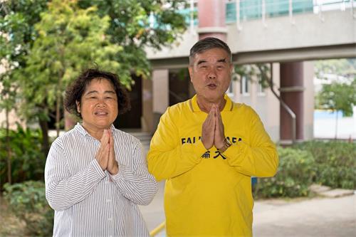 '图14:在台电公司上班的林先生贤伉俪,修炼后身心受益,亲朋好友多人走入修炼。'