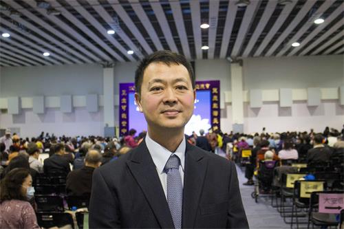 图6:来自高雄,在大纪元媒体工作的李先生:“很受触动的是同修的‘坚持’和‘实修’。”
