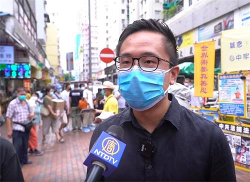 图9:区议员利瀚庭也说,今天面对国安法的威胁,法轮功街站依然在屹立,我们香港人正是要以此为榜样。