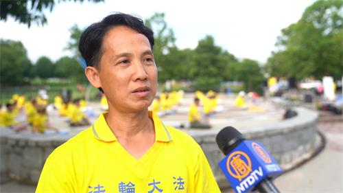 '图13:得法三年的学员奎浩(Qui Ho)表示修炼六个月后,全家人的病都好了。'