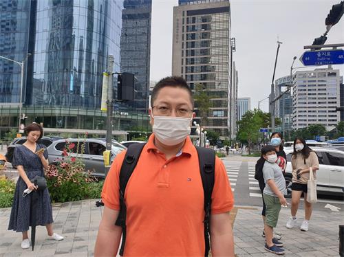 '图21:企业家金先生(Anrico Kim)了解到中共活摘器官的罪行,感到惊讶不已。'
