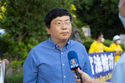 '图8:洛杉矶法轮功发言人、加州大学洛杉矶分校教授吴英年'