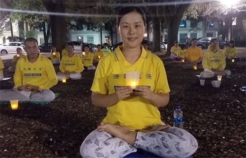 '图6:青年法轮功学员佩奇希望大法美好的声音被所有人听到,尽快结束迫害'