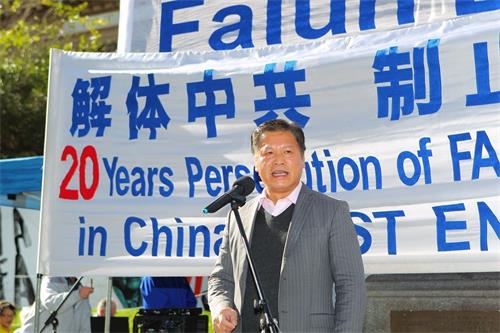 '图:二零一九年七月二十日,阮杰在墨尔本举行的法轮功反迫害集会上'