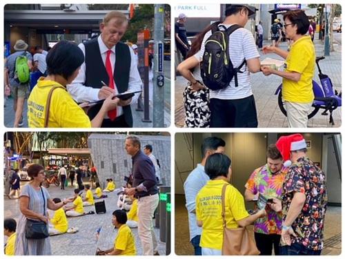 '图1~5:二零二一年十二月十日,在全世界纪念国际人权日之际,法轮功学员在昆士兰布里斯班市中心的乔治国王广场(King George Square)举办了讲真相活动'