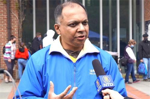 '图6:印裔法轮功学员桑托斯(Santosh Krishnamurthy)说,4.25彰显了法轮功学员的勇气和无所畏惧的精神。'