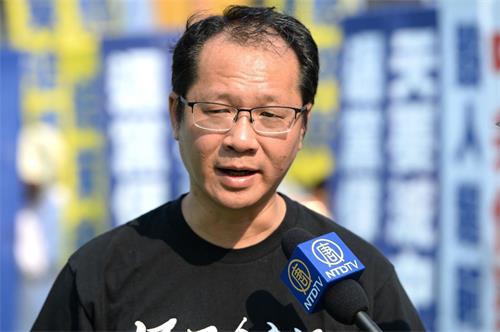 '图4:香港支联会秘书蔡耀昌称,法轮功的事件,在当代中国是一件大事。'
