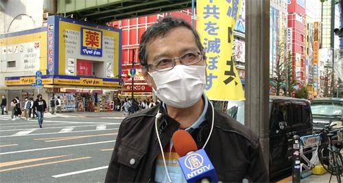 '图8:一位路人表示:“(中共)活摘器官太残酷了,必须要停止”'