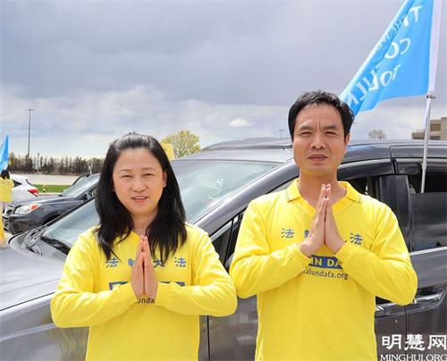 '图10:法轮功学员许高峰和太太王迎莉恭祝师父生日快乐!'