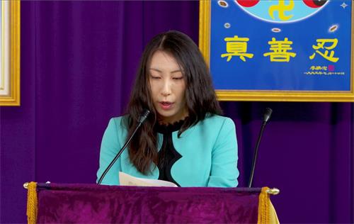 '图2:在客服部门工作游天黛在媒体法会上发言。'